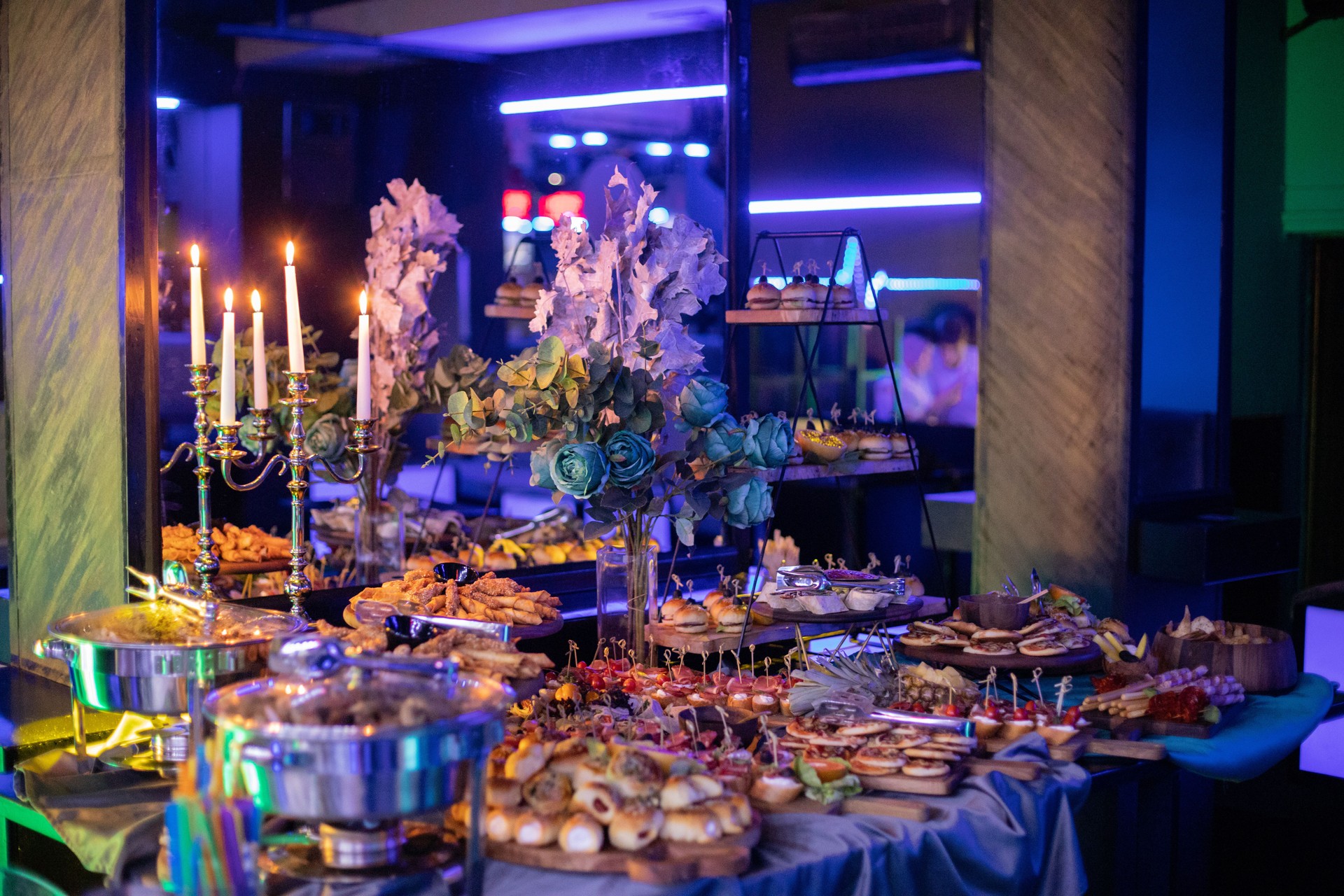 Food bar with different types of appetizers at an elegant party